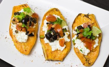 Sliced sweet potatoes with toppings