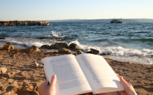 Reading a book on the beach